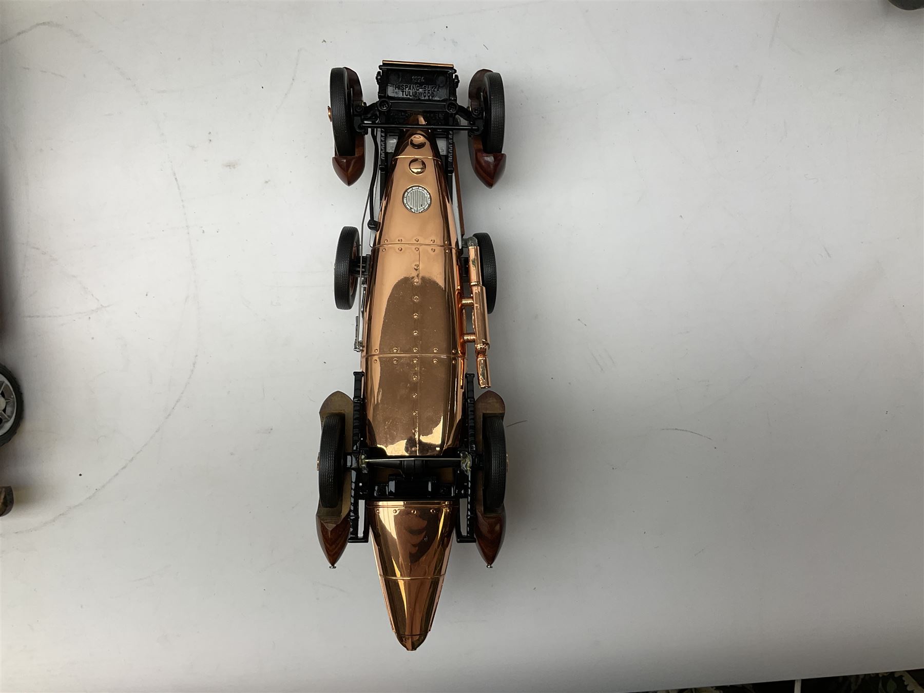 Four Franklin Mint Precision Models, one with hardwood body; large reproduction model of a vintage racing car L52cm; and four other modern metal/wooden models of vintage cars; all unboxed (9)