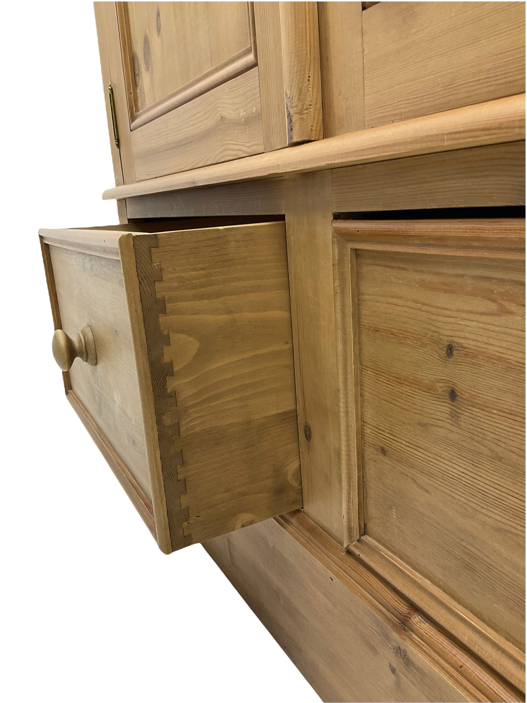Solid pine triple wardrobe with three drawers