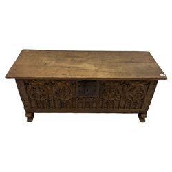 18th century and later beech and oak blanket chest, the front carved with Gothic arches and rayonnants, on arched sledge feet