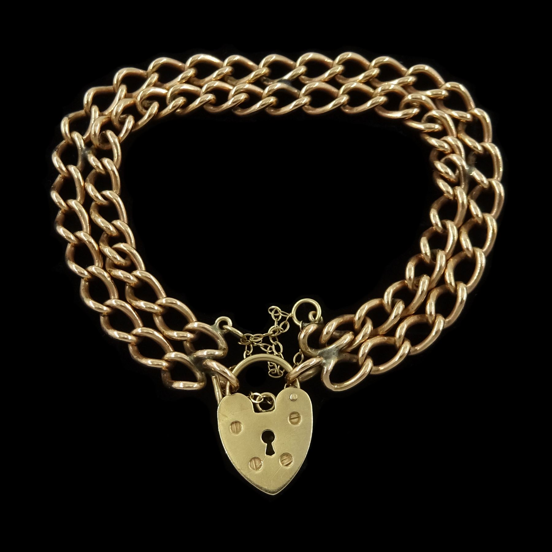 Edwardian 9ct gold double curb link bracelet, Chester 1901, each link stamped 9.375, with later 9ct gold heart locket clasp