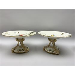 19th century Minton dessert service, comprising four comports, one tazza, and twelve plates, each hand painted with birds perched upon branches, and further detailed with insects and heightened in gilt, with printed retailers mark beneath for John Mortlock Oxford Street London, and impressed Minton mark to most, comport H13.5cm, plates D23.5cm. 
