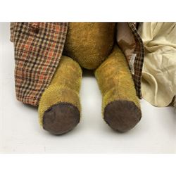Two early 20th century straw filled jointed teddy bears, first example wearing a tweed jacket bearing Geoffrey Saville label, with leather padded paws and ears, horizontally stitched nose and humpback; second example with applied eyes, vertically stitched nose and faux leather paw pads, both with growler mechanisms, tallest H74cm 