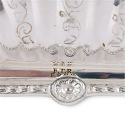 Silver-plated Victorian style biscuit box, in a shell form with engraved leaf detailing, upon scroll feet, H24cm