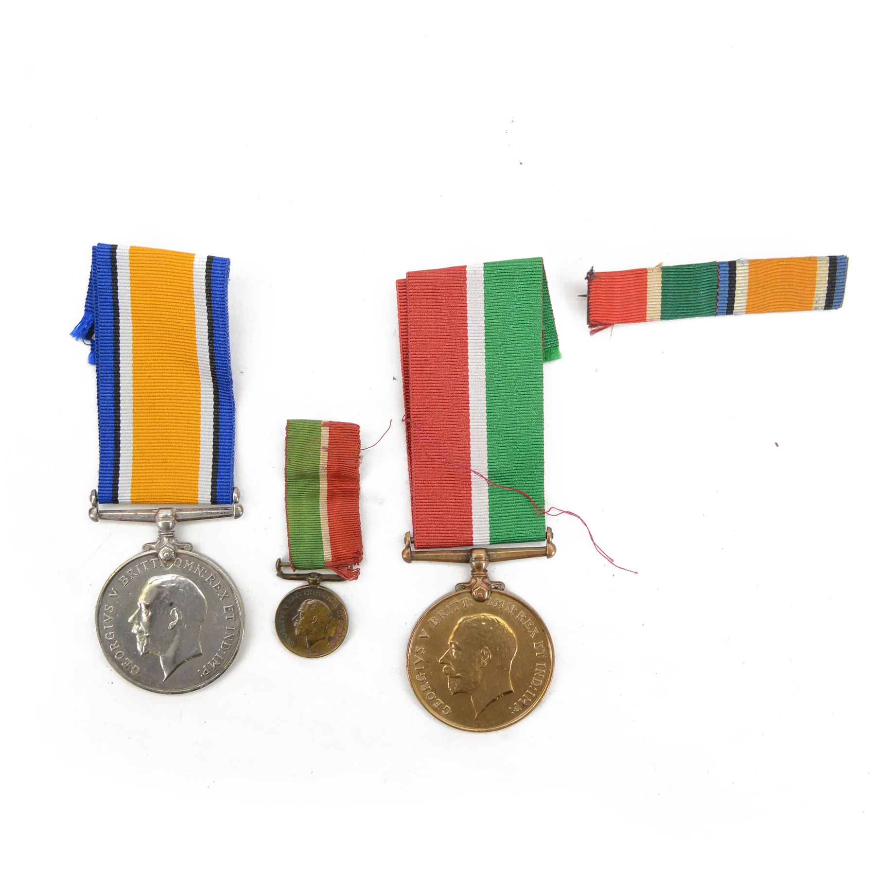 WWI medal pair awarded to female recipient; Mercantile Marine British War and Mercantile Marine Medals, awarded to Charlotte R. Stobie, with miniature of  Mercantile medal and medal ribbon 