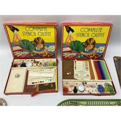 Kiddies Real Cooking Range being a methylated spirit heated tin-plate oven L23cm; boxed; small Circus bagatelle game; tin-plate clockwork railway track; two Stencil Outfits etc