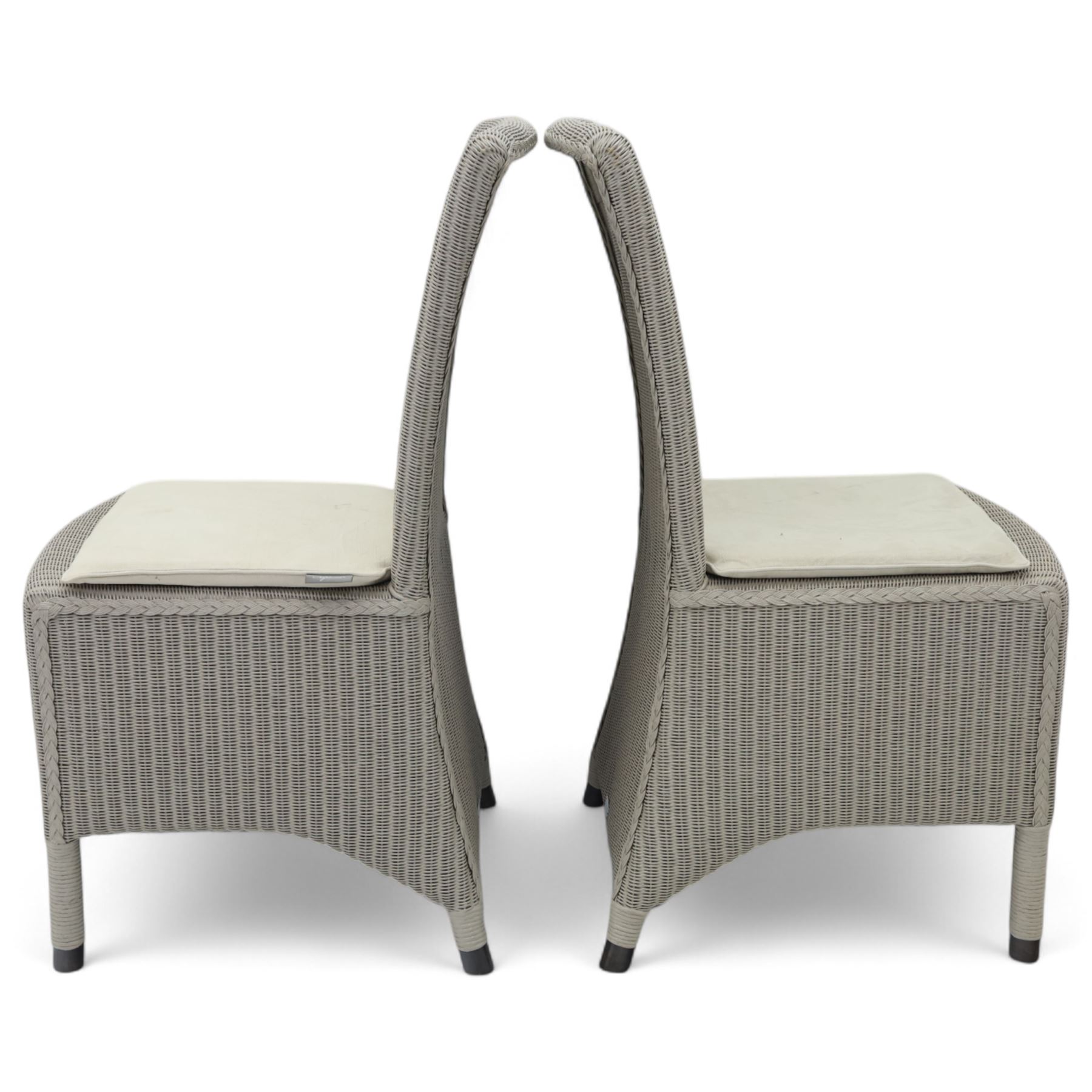 Neptune – Sheldrake limed oak extendable dining table and eight Havan loom chairs, the oval top in limed oak finish with four additional leaves extending the table to seat up to ten (Extends to cm), raised on turned legs with two additional centre supports, the matching Havan loom chairs finished in grey with cream upholstered seat covers (H 95cm, W 47cm, D 55cm)