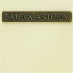Laura Ashley - 'Clifton' demi-lune chest, fitted with four graduating bow-front drawers with brass swan neck handles, raised on turned supports, in ivory finish