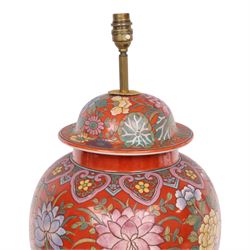Table lamp of baluster form, decorated with ducks and lilies upon a red ground upon a circular wooden base, H64cm