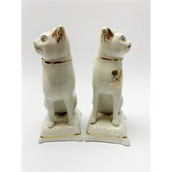Pair of Victorian Staffordshire cats, modelled seated upon cushions, with gilt detail throughout, H18cm