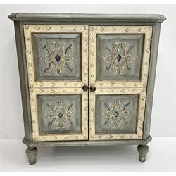 Contemporary painted cabinet, moulded rectangular top with canted corners over two panelled doors with painted decoration, on turned feet