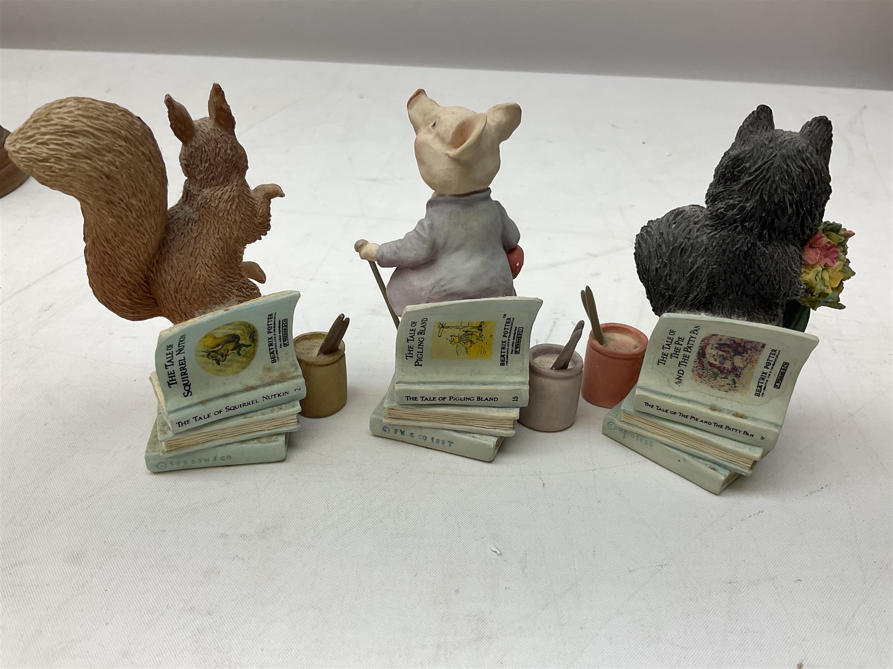 Frederick Warne & Co The World of Beatrix Potter figures to include Peter Rabbit in Mr Mcgregor's Garden, Peters Hiding place, Mrs Tiggy Winks, The Tale of Jonny Town-Mouse, etc, many with original boxes 
