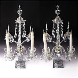 Pair of cut-glass two-light four branch candelabra, each with spike finials supporting an ...