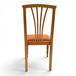 Knightman - set of nine cherrywood dining chairs, with fan splat backs and upholstered seats, raised on square legs joined by stretchers, comprising chairs of slight differing widths and one chair with turned front legs and orange upholstery and no Knight carving, the rest with recessed carved knight trademark, by Horace Knight of Old Mill Furniture, Balk near Thirsk 