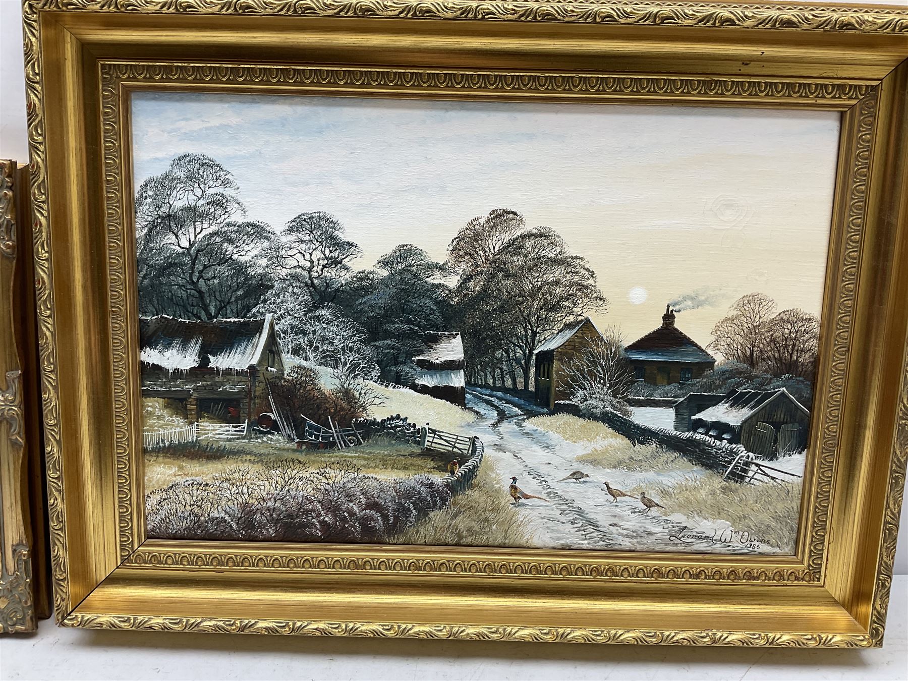 Leonard W Owens (British 20th century): 'Pheasants by a Farm near Hutton-Le-Hole', oil on canvas signed and dated 1986 together with Chris Hammond  (British 20th century): 'Springtime', watercolour signed, titled and dated 1990 verso max 30cm x 45cm (2)