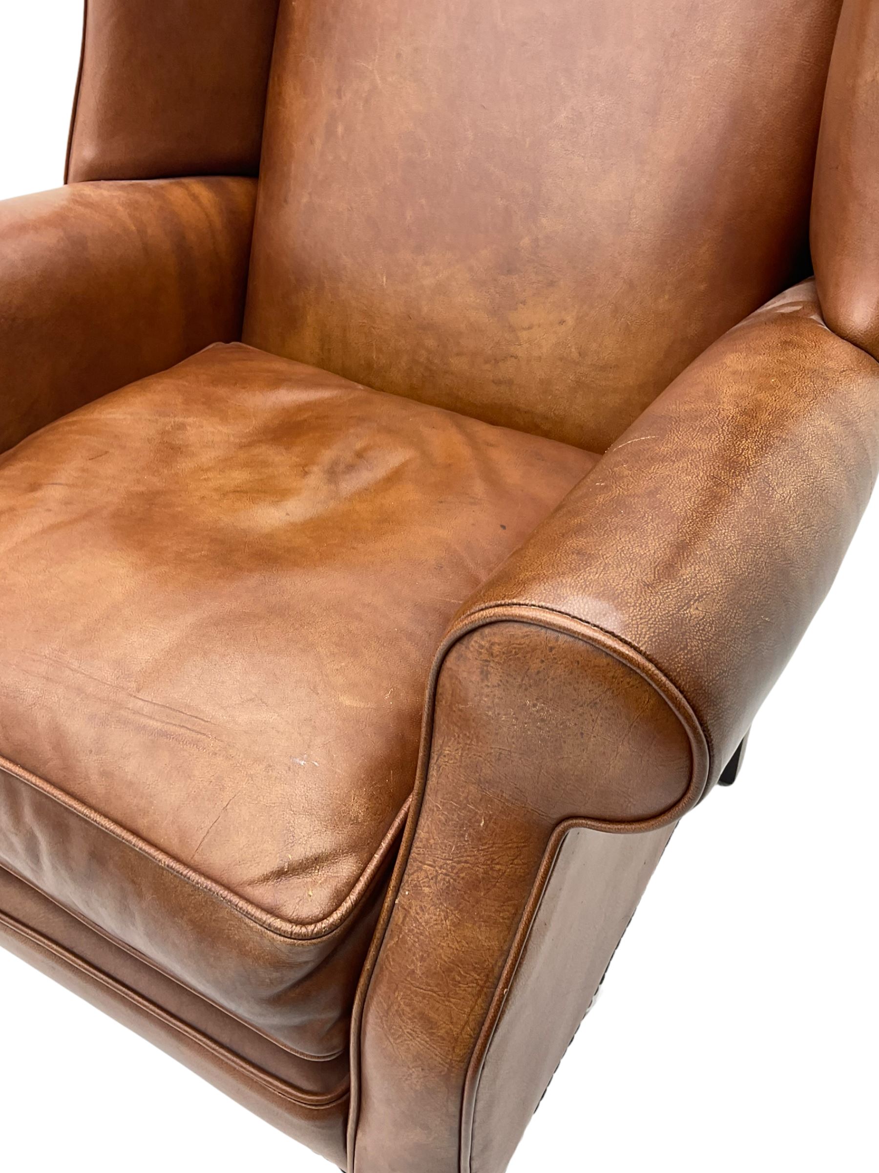Laura Ashley - wingback armchair, upholstered in brown leather, on cabriole front feet