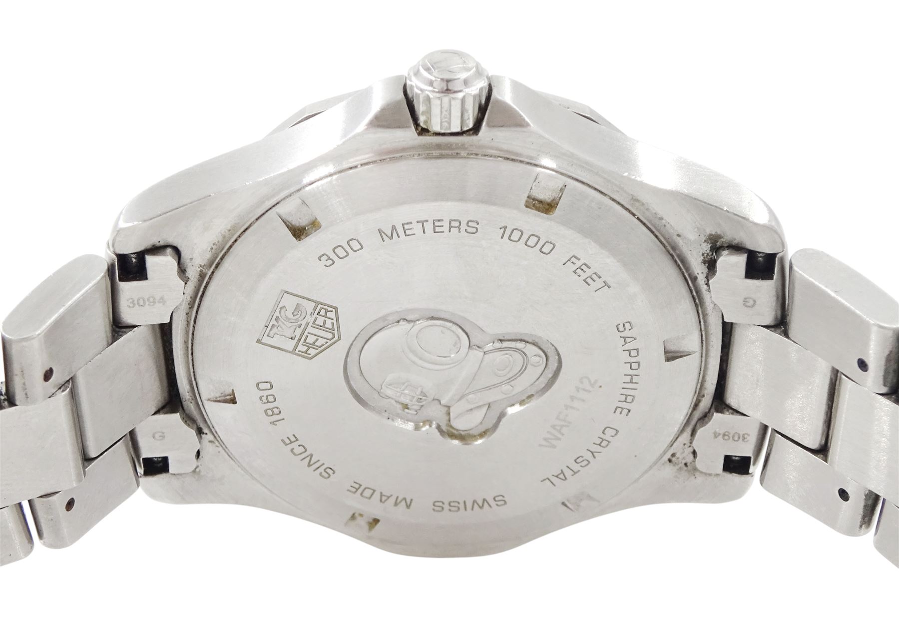 Tag Heuer Aquaracer 300 meters gentleman's stainless steel quartz wristwatch, Ref. WAF112, silvered dial with dagger hour markers and date aperture, on original stainless steel bracelet , with fold-over clasp, boxed with additional links and guarantee card dated 2007