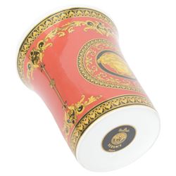 Rosenthal Medusa Versace vase, featuring a gold-shaded Medusa head surrounded by baroque details upon a red ground, H18cm 