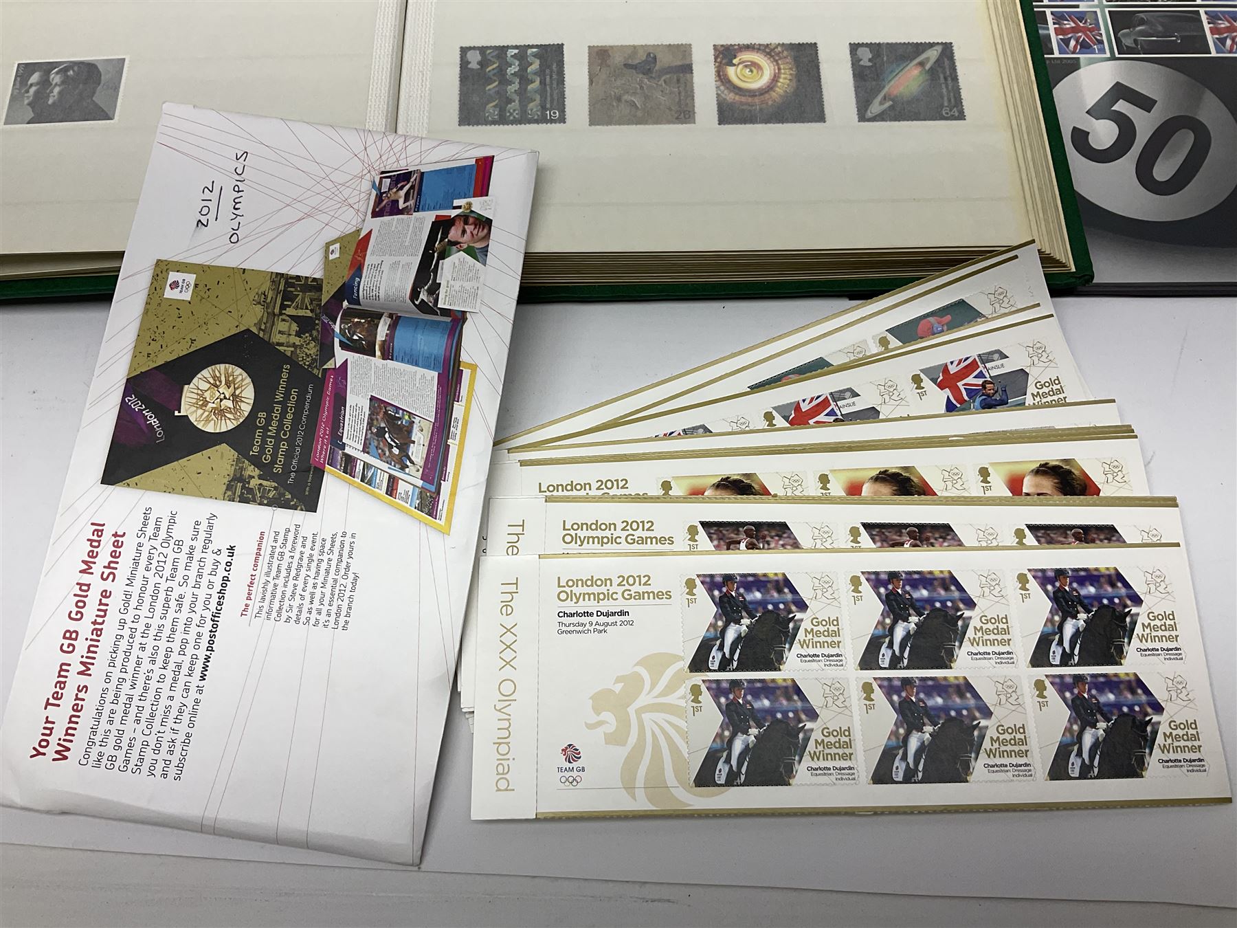Queen Elizabeth II mint decimal stamps, mostly London 2012 Olympic games 1st class, face value of usable postage approximately 535 GBP