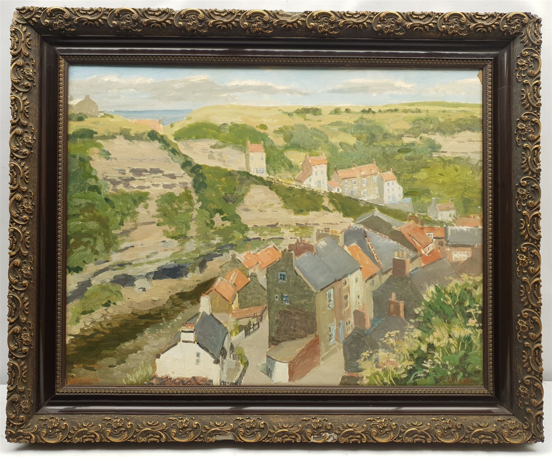 E C Clark (British 20th century): Church Street Staithes looking towards Cowbar, oil on board signed 50cm x 65cm