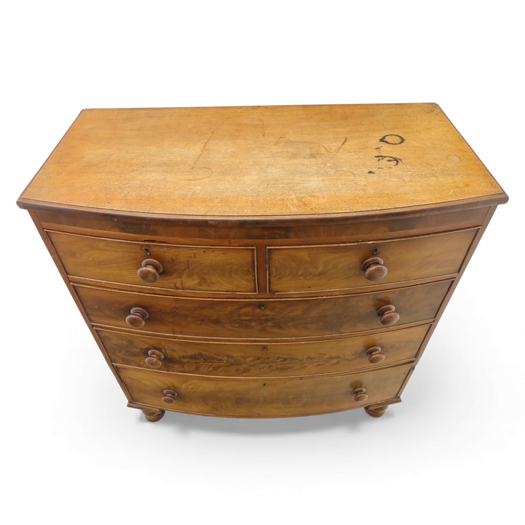19th century mahogany bow-front chest, with two short over three long graduated drawers, fitted with turned wooden knobs, raised on turned bun feet