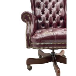 Hancock & Moore - swivel office desk chair, upholstered in buttoned burgundy leather with studded bands, five-spoke base on castors