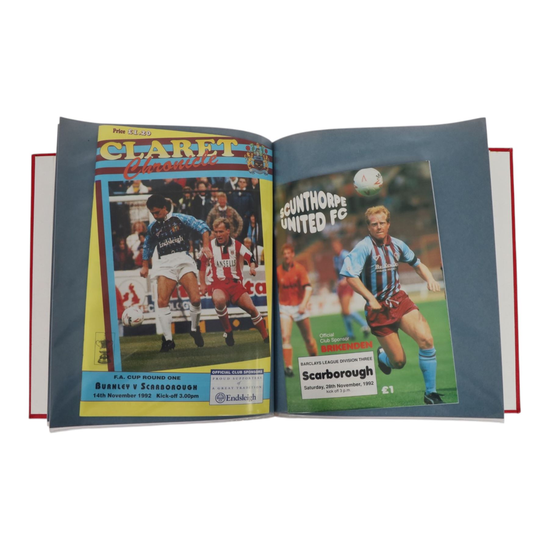 Comprehensive collection of approximately one hundred and seventy Scarborough FC football programmes for the 1990/91, 1991/92 and 1992/93  seasons, all filed within six dedicated Scarborough FC red Home and Away binders