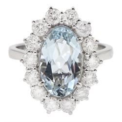 18ct white gold oval aquamarine and round brilliant cut diamond cluster ring, hallmarked, aquamarine approx 2.45 carat, total diamond weight approx 1.20 carat