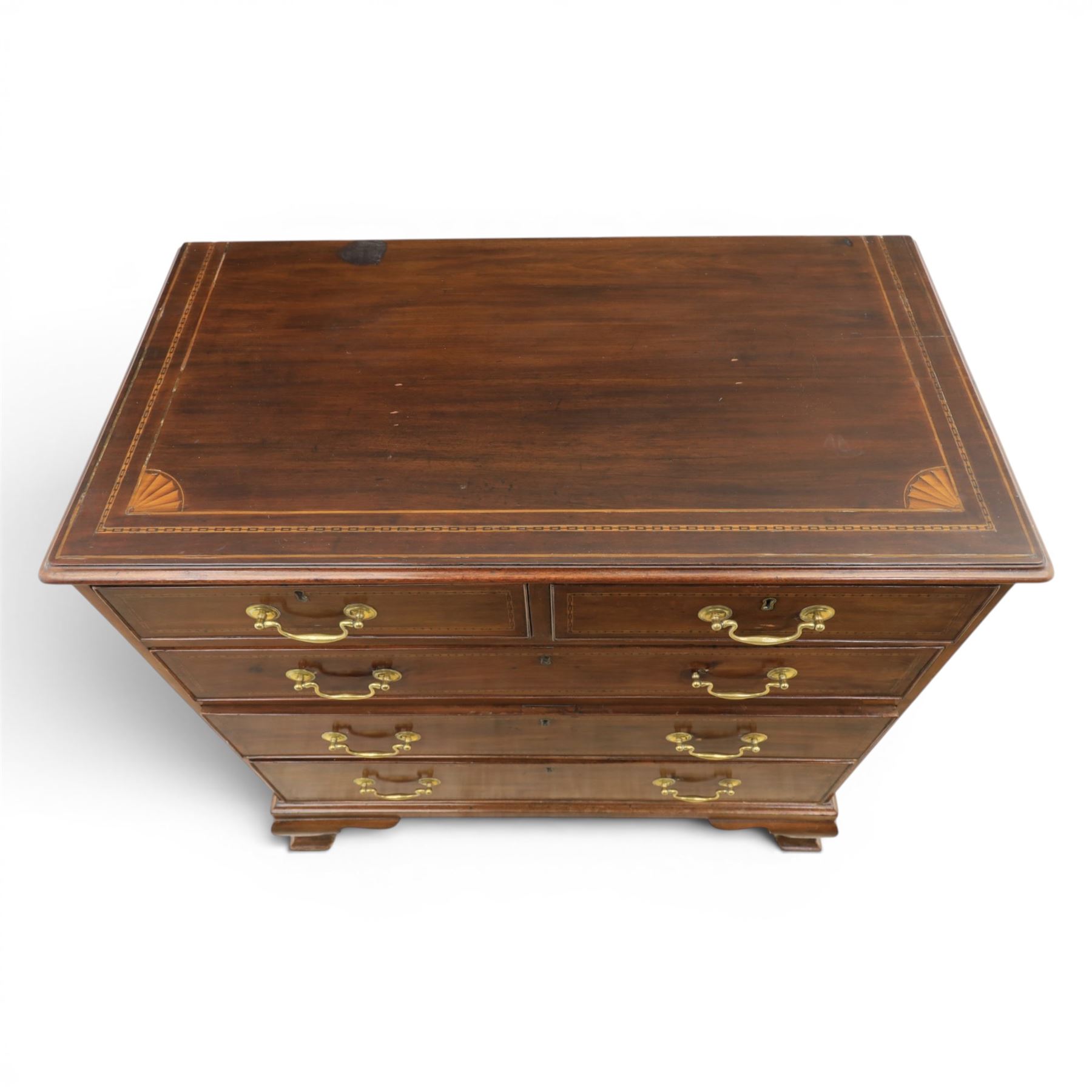 George III inlaid mahogany chest, shell inlaid and line chain detail, brass swan neck with cockbeaded edges, raised on bracket feet  