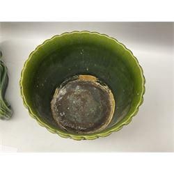 Jardiniere and stand, the jardiniere modelled as a pale, the stand with foliate and foliage decoration on a green ground, stand H73cm 