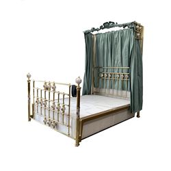 Victorian style brass 4’ 6” double half tester bed with porcelain finials, drapes and covers, fitted with divan base
