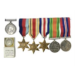 WWII group of five medals comprising 1939-45 War Medal, Defence Medal, 1939-45 Star, Africa Star and France and Germany Star on wearing bar; WWI British War Medal awarded to 142019 Pte. A. Thompson A.S.C.; and boxed King's Badge 'For Loyal Service'