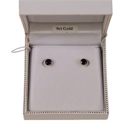 Pair of 9ct gold blue stone stud earrings, boxed