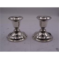 Pair of 1920's silver mounted dwarf candlesticks, of typical form, hallmarked Marson & Jones, Birmingham 1920 and 1921, H7.5cm