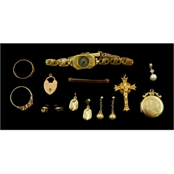 Gold locket pendant, ring, bar brooch, cross and jewellery oddments, all 9ct stamped or hallmarked, 15ct gold heart locket hallmarked and an 18ct gold wristwatch, hallmarked on a gilt bracelet