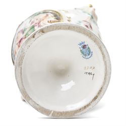 Capodimonte vase and cover decorated with a raised pattern of cherubic figures H32cm, another vases and cover with panels of figures H33cm, bowl and cover with similar decoration D20cm and two other Capodimonte pieces (5)