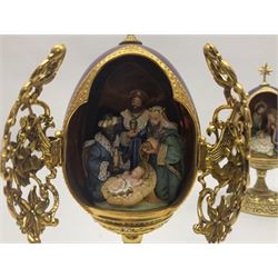 Franklin Mint House of Faberge three collectors eggs, comprising A king is born, We three kings, The flight into Egypt