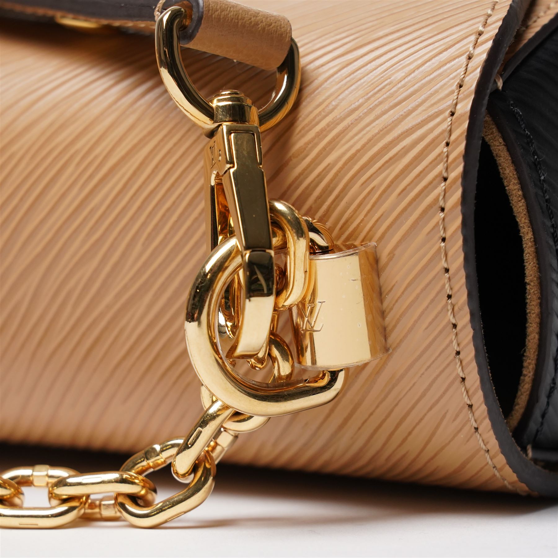 Louis Vuitton - ‘Twist’ MM Bag, the model introduced for the Cruise 2015 collection under Nicolas Ghesquière, in structured beige Epi cow hide leather with black sides, with gold-tone signature LV monogram twist-lock fastening and chain carrying handle, with detachable flat leather shoulder or crossbody strap, unused with original box and dust bag