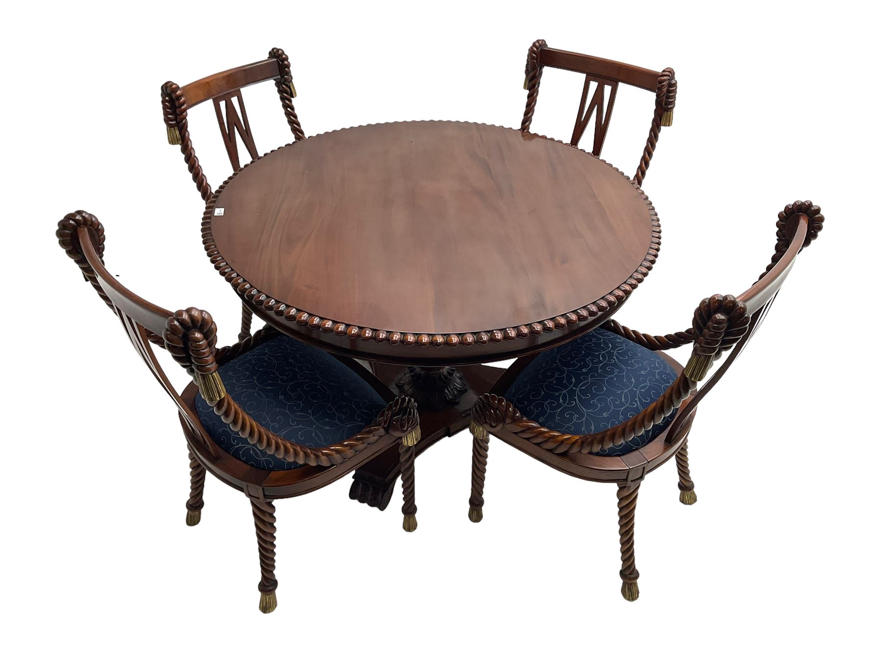 Regency style dining set - the table with circular tilt-top on turned and carved column, concaved triangular platform with three scroll carved feet, together with set four rope twist dining chairs with upholstered drop in seats
