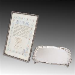 1920s silver salver, of octagonal form with shaped rim upon four scroll legs, with wedding...