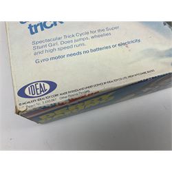 Ideal Derry Daring and Her Trick Cycle, with clothed figure on trick cycle and winder; in original illustrated box dated 1975