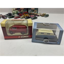 Over forty 1:76 scale die-cast models of cars and commercial vehicles; some boxed; and eight small scale models of motorcycles; all unboxed