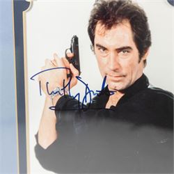 James Bond 40 years 20 films signed commemorative montage, comprising signed photographs of Sean Connery, George Lazenby, Roger Moore, Timothy Dalton and Pierce Brosnan, each with a certificate of authenticity from UACC Dealer Lester Freeman, framed, frame H79cm, W100cm