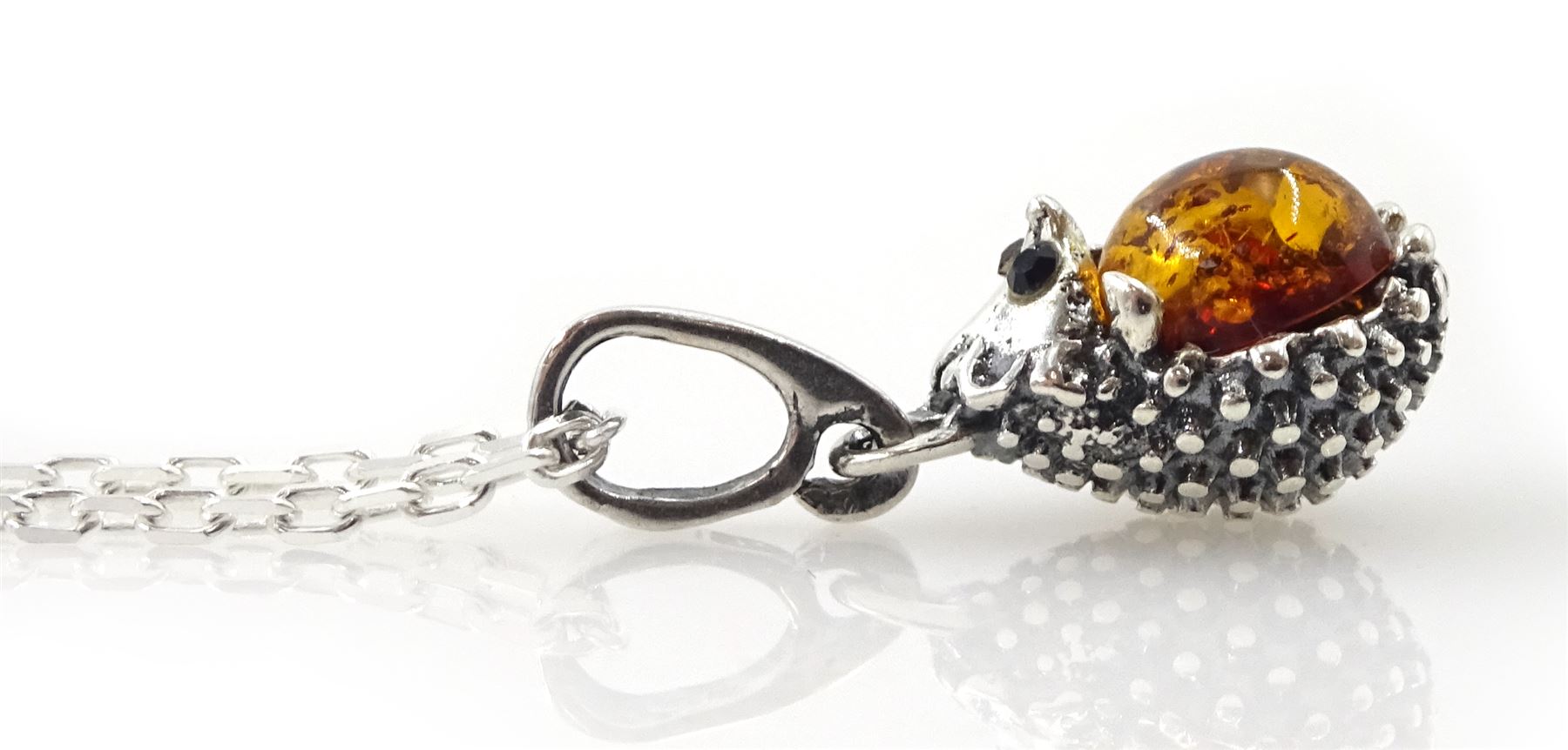Silver Baltic amber hedgehog pendant necklace, stamped 925 
