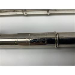 Boosey & Hawkes London Regent three-piece flute, serial no.345447; in B&H Bandhite hard carrying case; and Deg Music Company Inc. USA Claudel Model three-piece flute, serial no.491718, in hard carrying case (2)