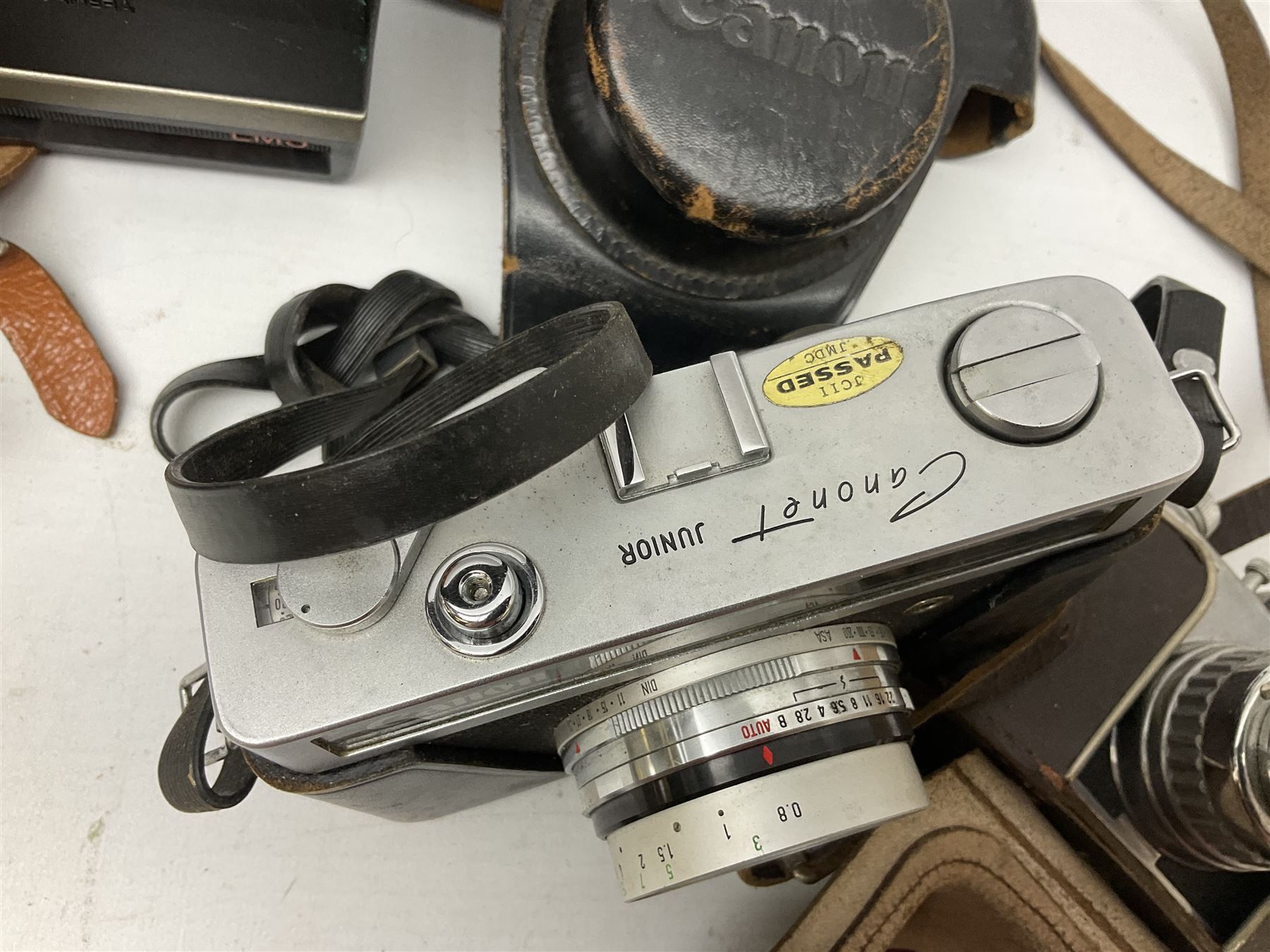 Brass telescope, together with Zenith 7 x 50 field binoculars, two polaroid cameras and other cameras and equipment 