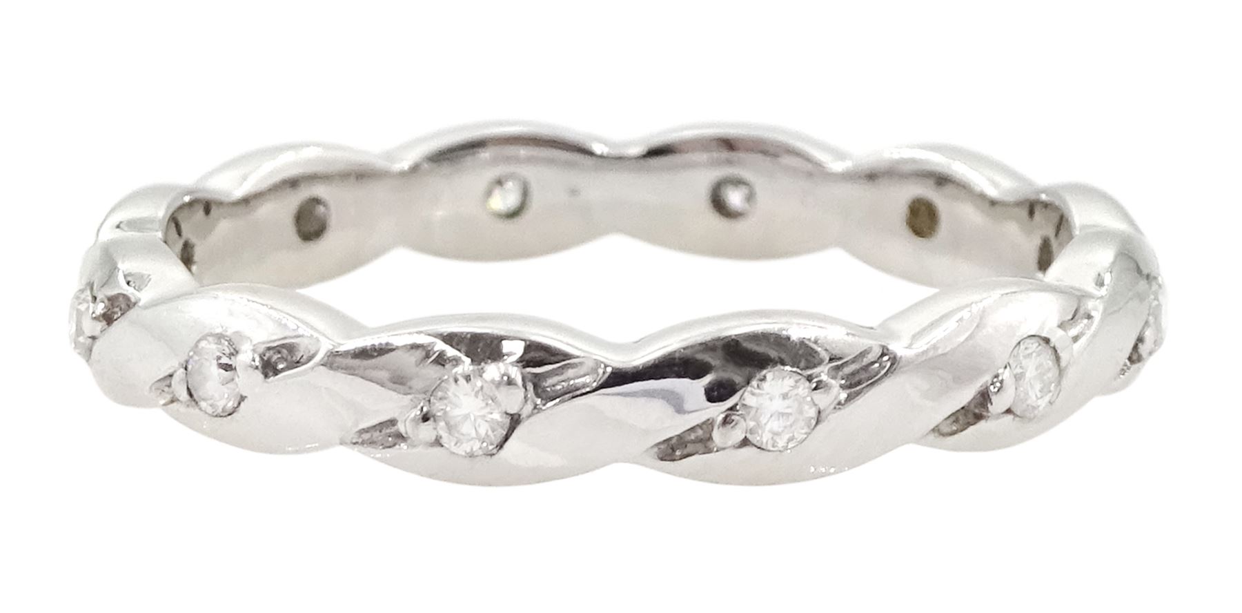 18ct white gold diamond full eternity ring, crossover set with twelve round brilliant cut diamonds, hallmarked