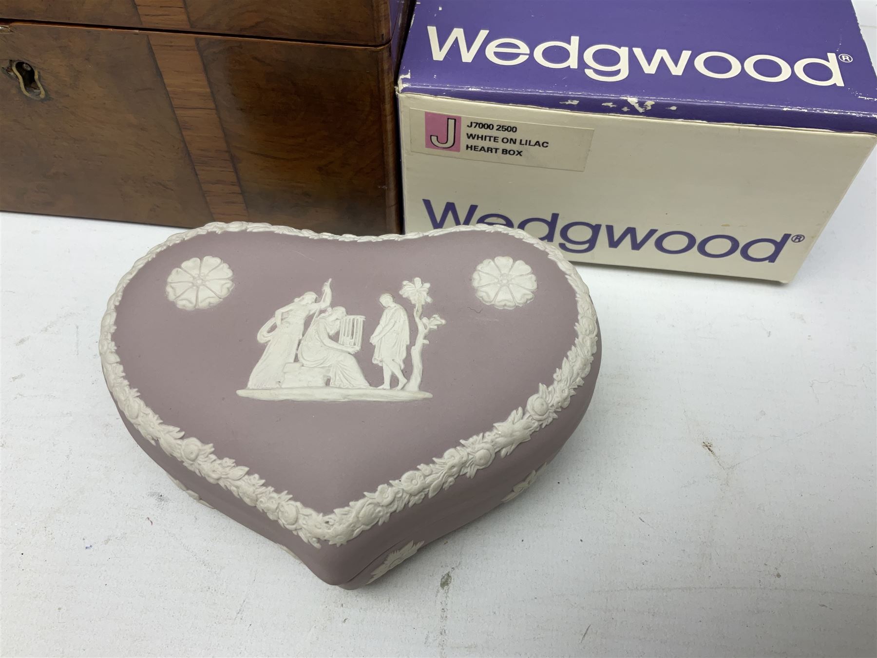 Wedgwood Jasperware to include lilac trinket box with original box, light blue vases, trinket dishes, boxes etc, together with a walnut box, coins and other collectables 