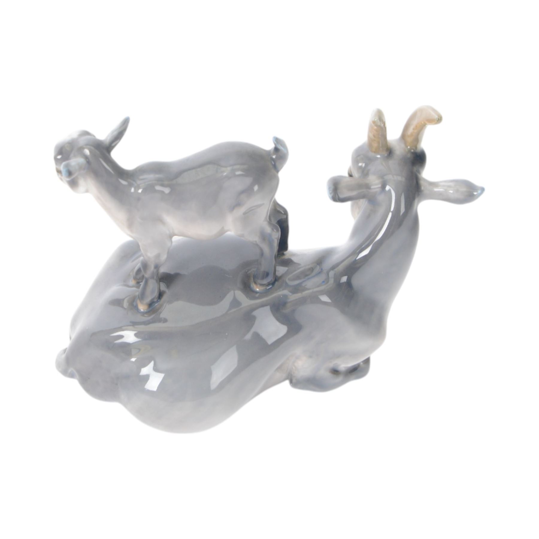 Five Royal Copenhagen figures, including Mare and Foal no.698, Goat and Kid no. 4744, Fox and Cubs no.1788