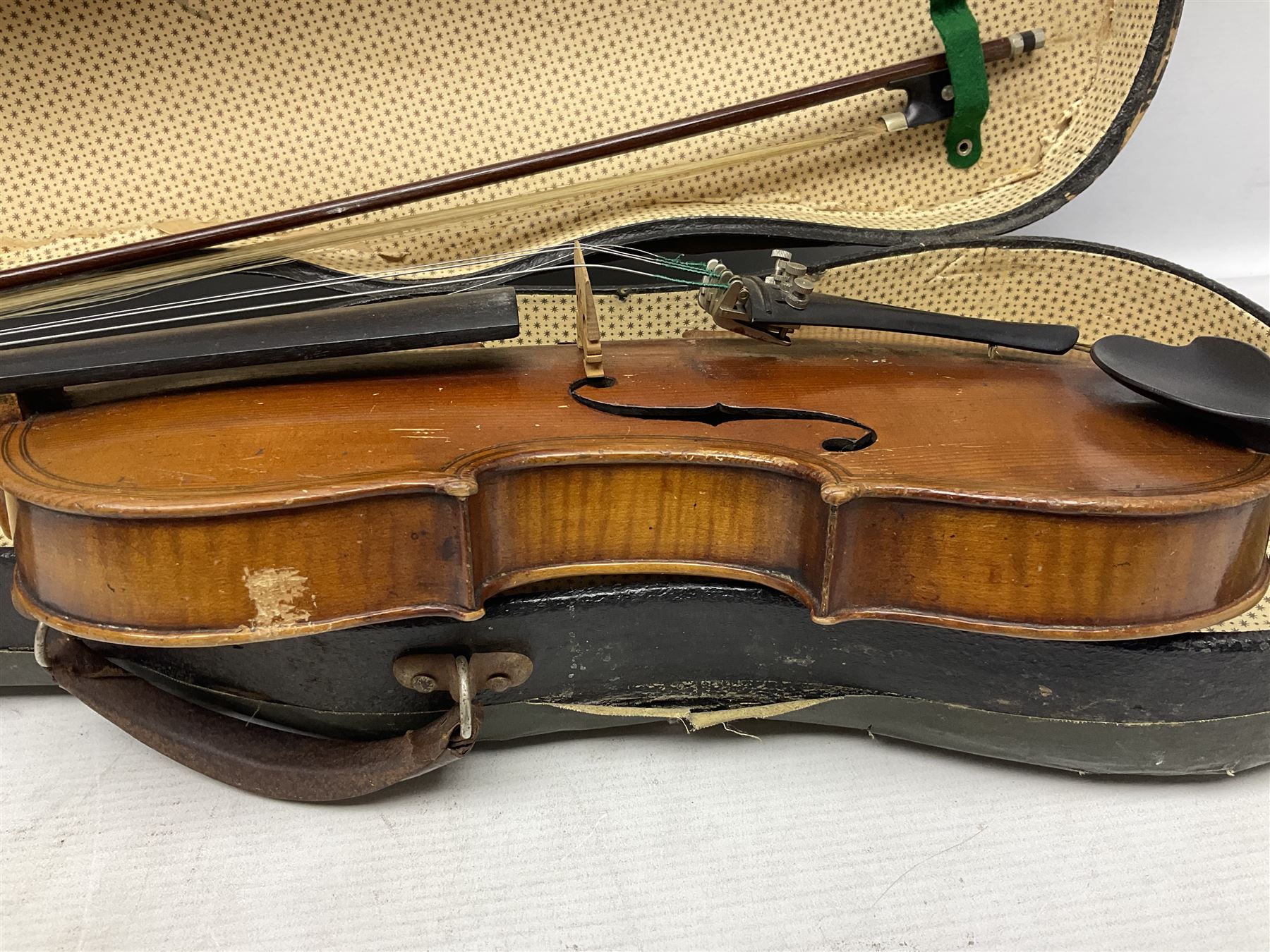 German copy of a Maggini violin c1900 with 35.5cm two-piece maple back and ribs and spruce top, bears label 'Maggini Deutsche Arbeit 1866' L59cm; in carrying case with bow