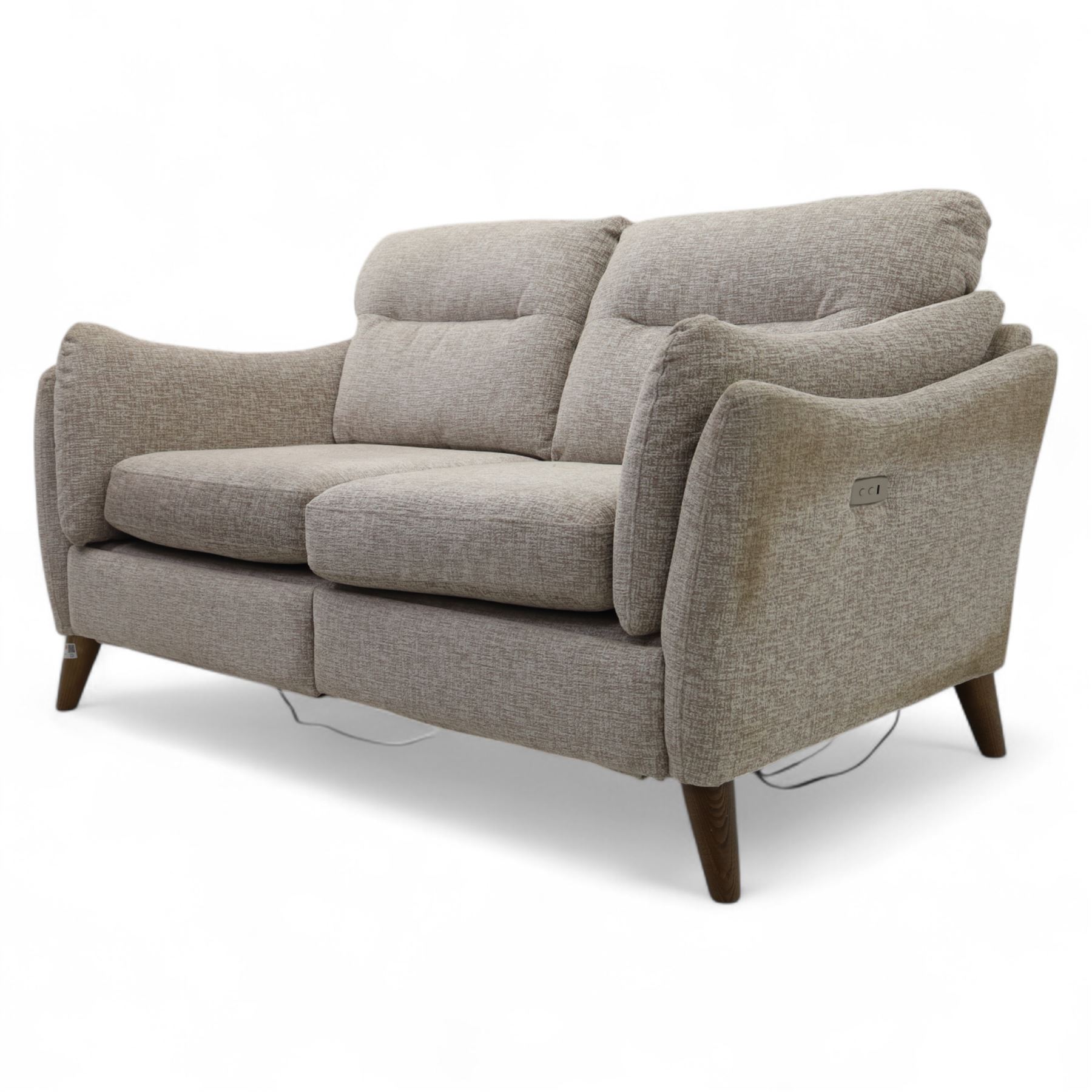 Ashwood - ‘Calypso’ 2-seater motion lounger, upholstered in light stone grey textured fabric with flared arms and split back cushions, fitted with dual electric recline controls, raised on stained tapering legs